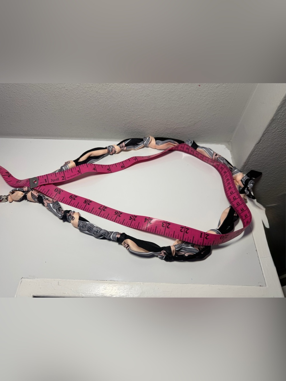 Silk-Twilly Pink and Black tied onto a leather lanyard holder/cell phone cord. - Picture 5 of 12